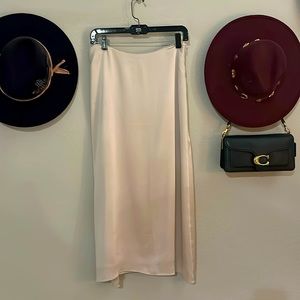 Vince slip skirt in luminous satin
A-line silhouette
